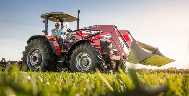 MF 5700 series tractor in a green field