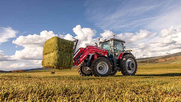 Massey Ferguson 8s tractor combining hay